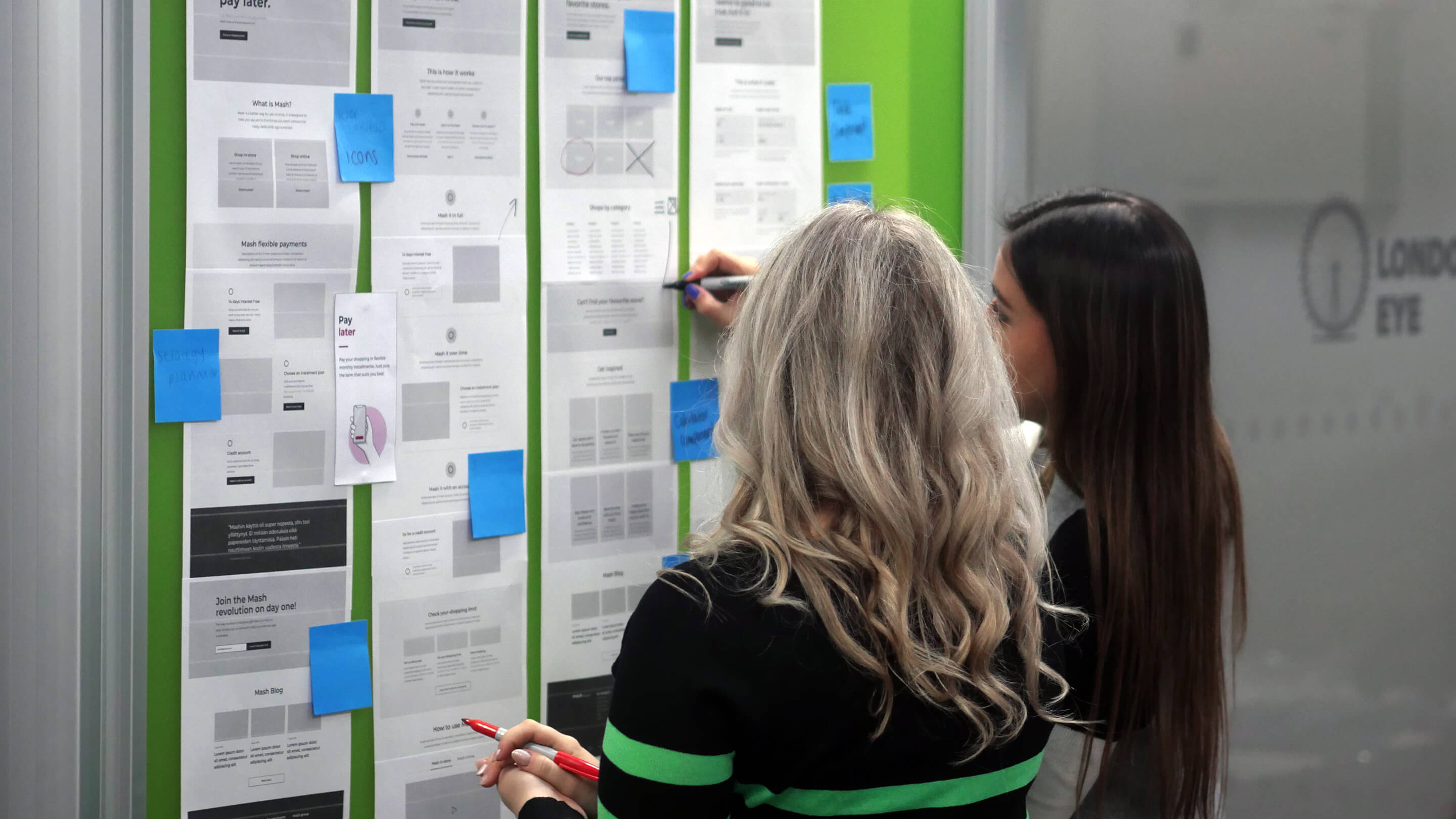 2-women-creating-website-wireframes