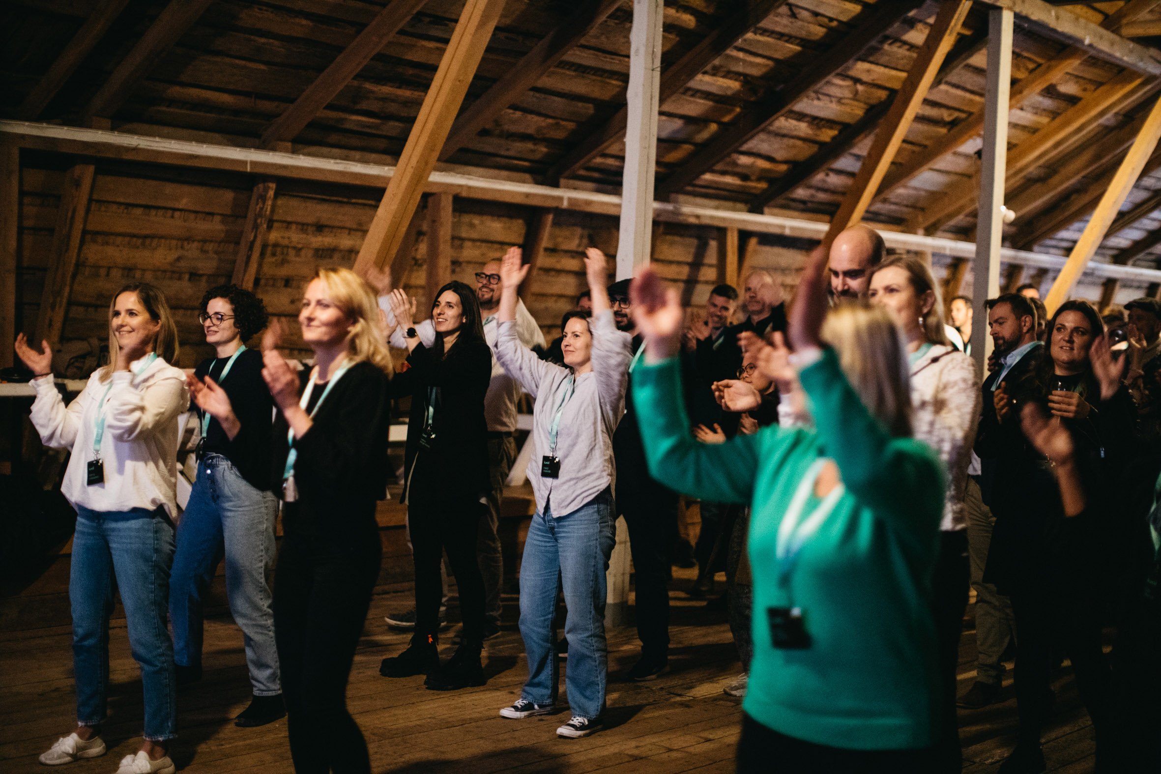 group people dancing in barn