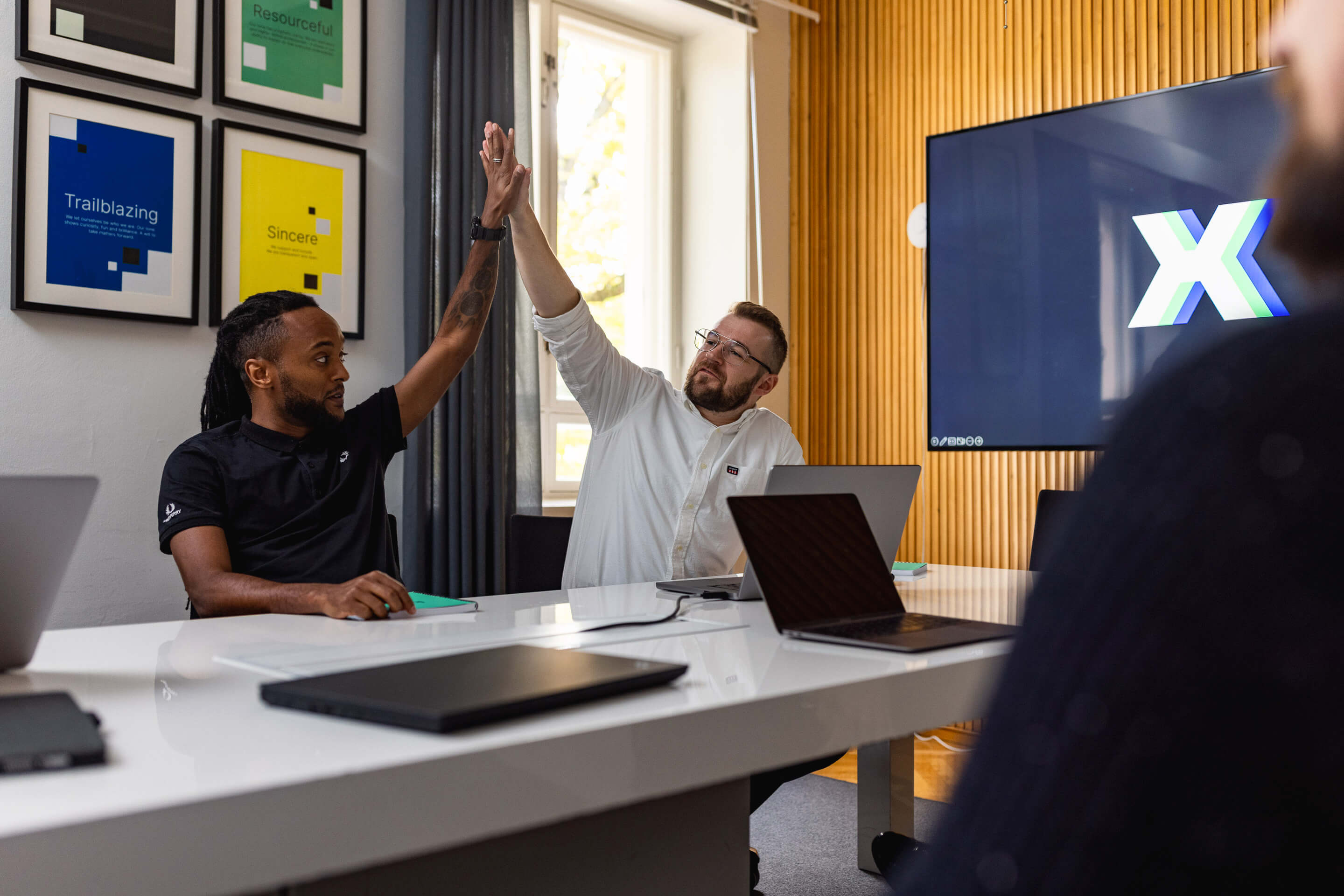 2-men-in-office-high-five