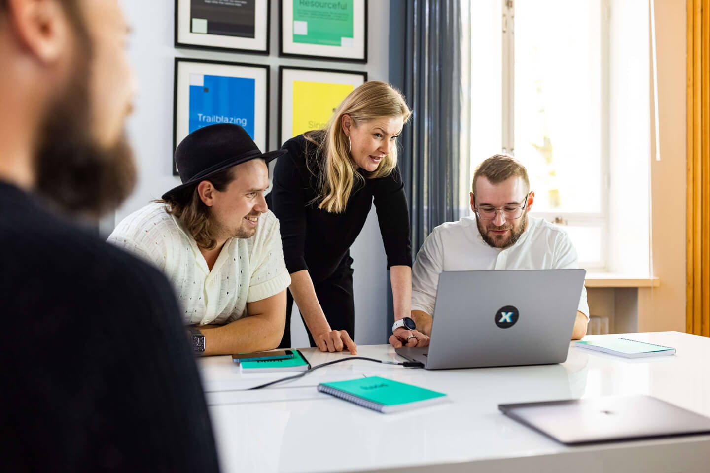 people-focused-at-laptop-in-an-office