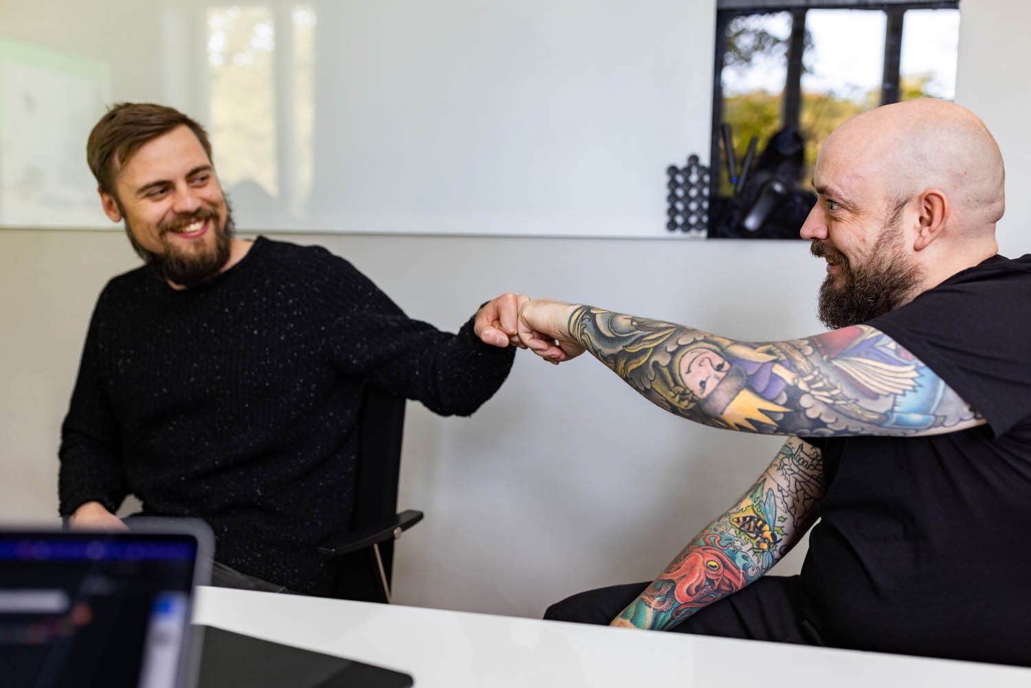 two-persons-fist-bump