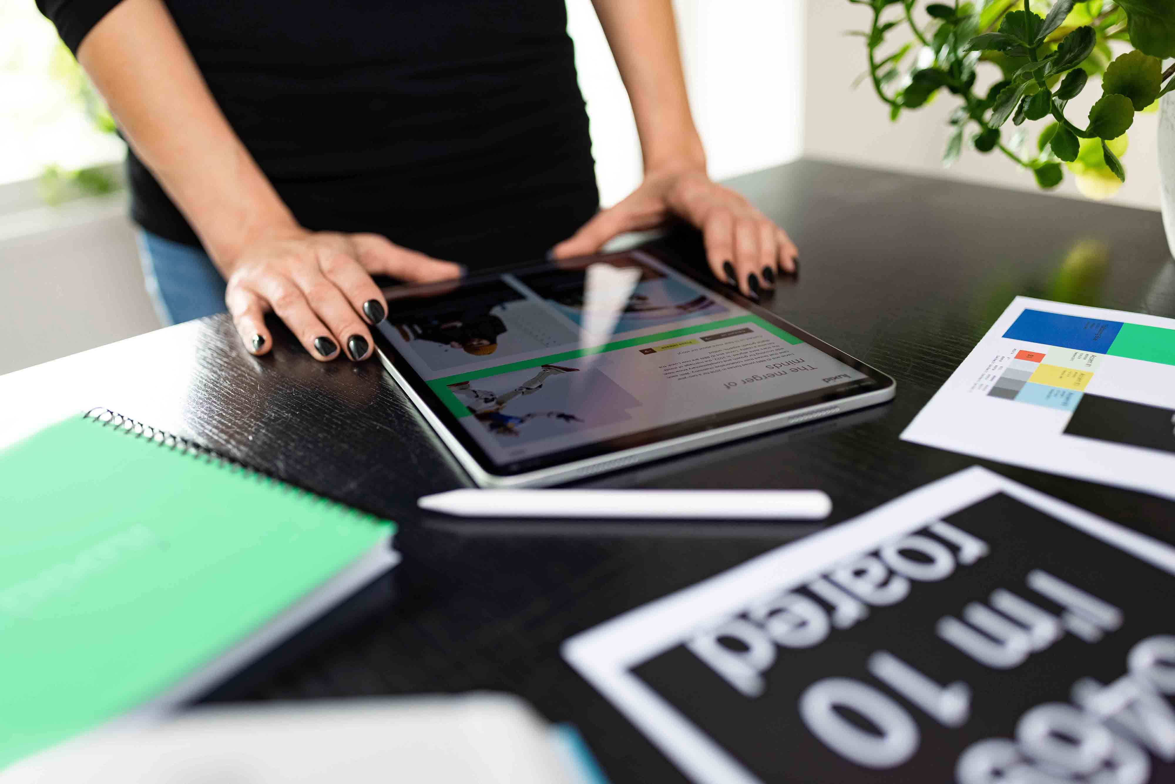 office-woman-tablet-workspace